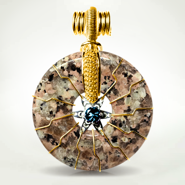 14kGold - frederick-shute-david-sereda-pendant-flower-of-life-egyptian-rose-granite-blue-topaz-gold_1024x1024@2x.png